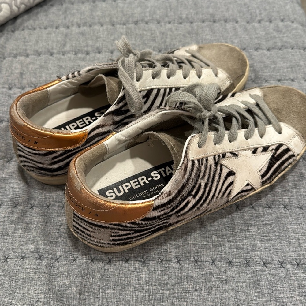 Ltd. edition Golden Goose. Pair #61/625 made.